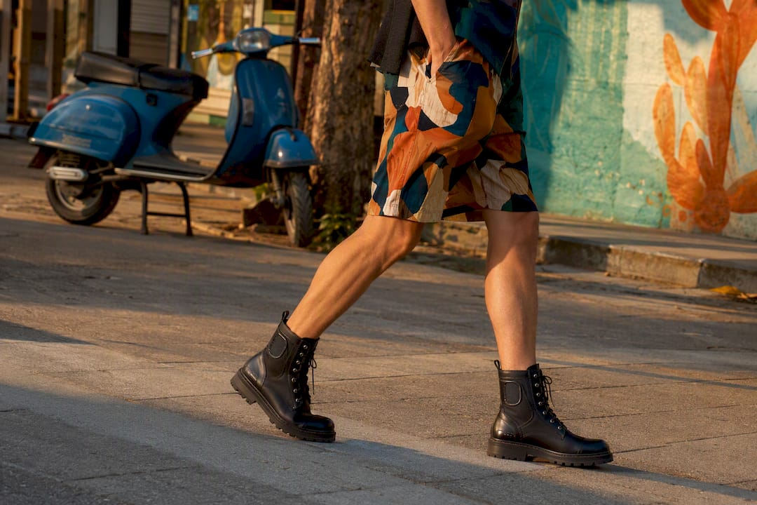 Mid-thigh shorts worn with vegan combat boots