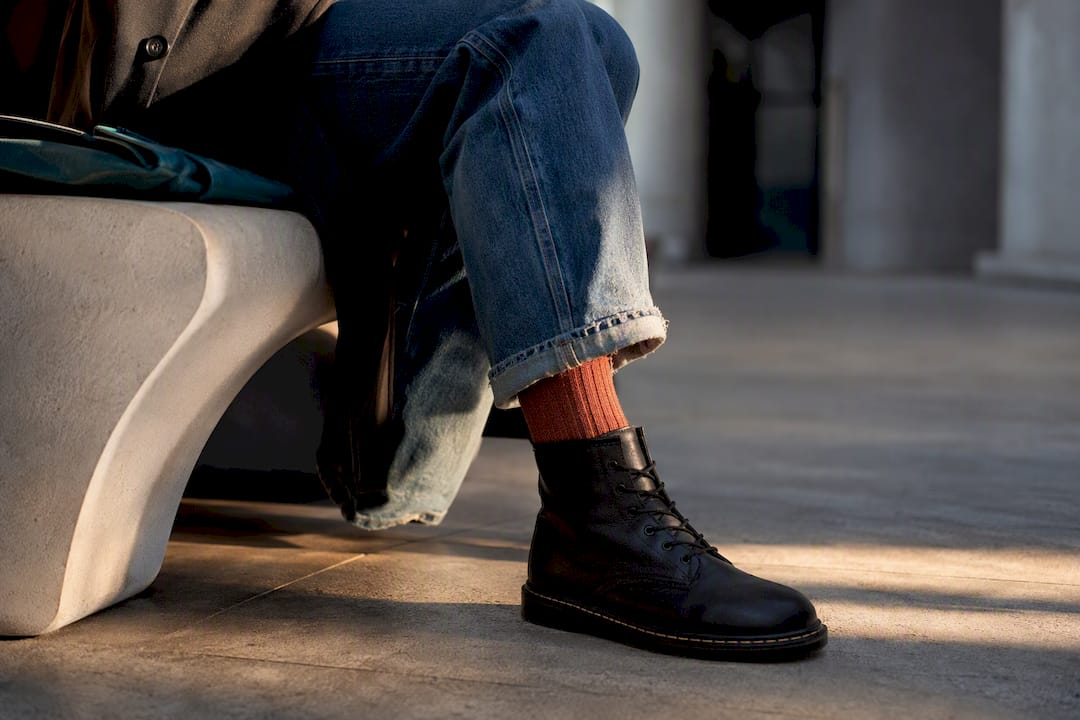 Cuffed jeans styled with combat boots
