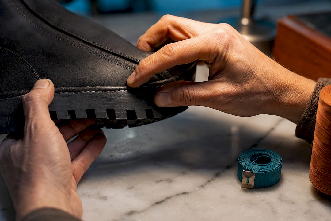 Close-up of stitched vegan boot sole edge