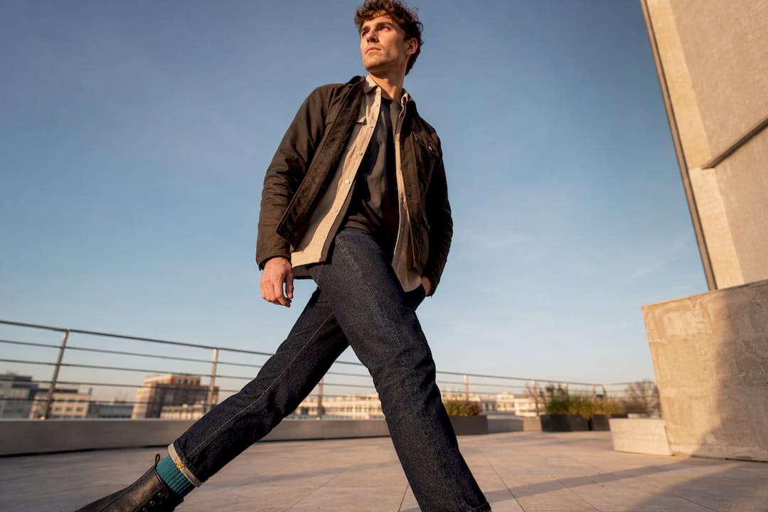 Man styling layered combat boot outfit