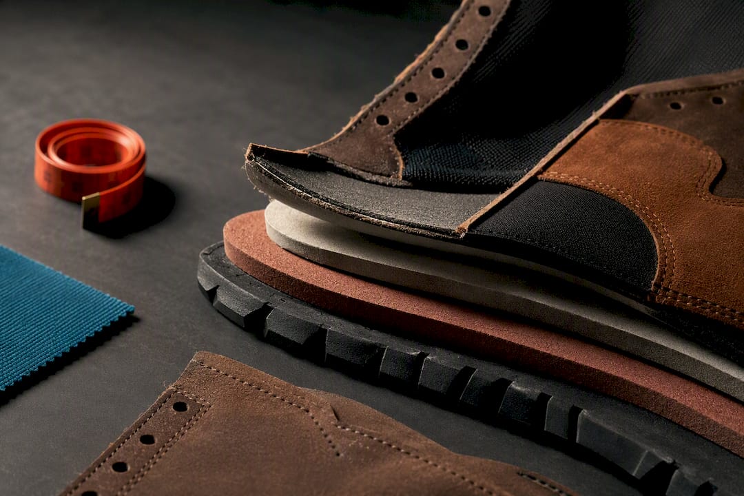 Layered combat boot construction close-up