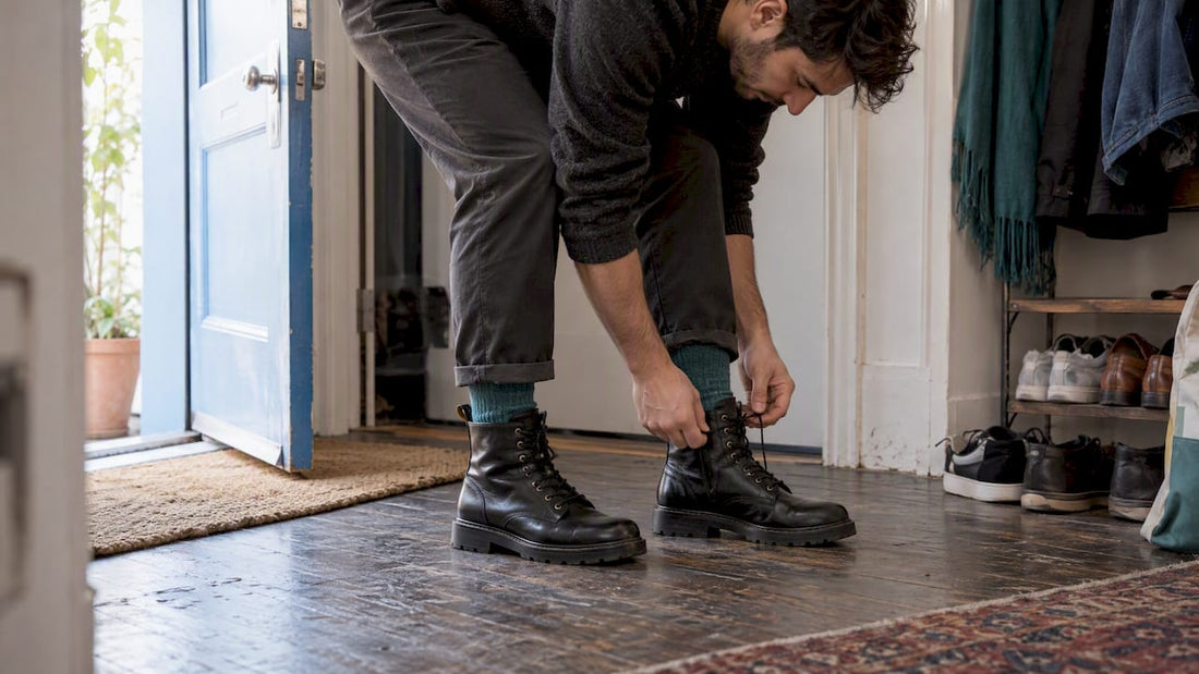 Person adjusting vegan boots over thick socks