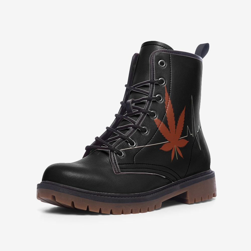 Elevate your style with Cannabis Leaf Vegan Combat Boots. Crafted from durable vegan leather, these eco-conscious boots are perfect for those who want comfort, durability, and bold style. Shop now!

