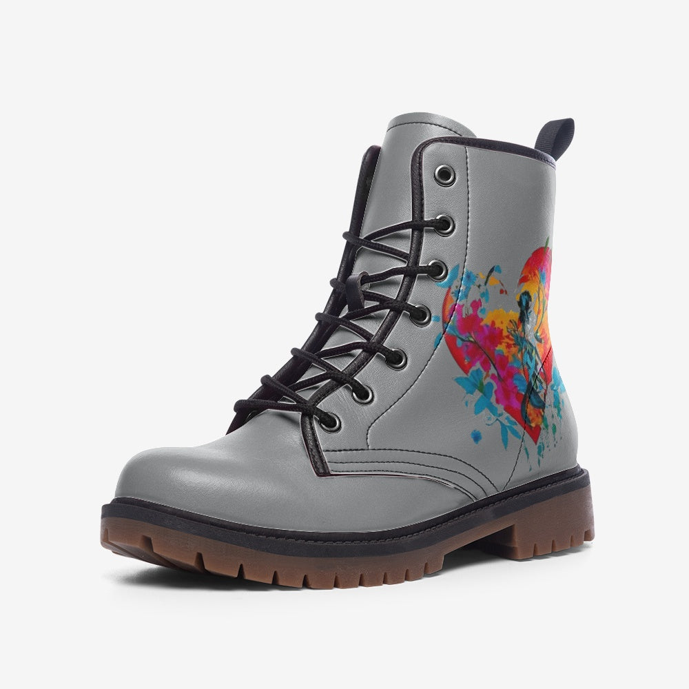 Discover the Vibrant Heart Vegan Combat Boots with a bold, colorful heart design. Crafted from 100% vegan leather, these boots combine style, comfort, and sustainability. Shop now and step into a cruelty-free future with durable, eco-conscious fashion.